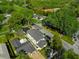 This aerial view highlights the home's proximity to a golf course and lush greenery, creating a serene atmosphere at 500 W Hazel St, Orlando, FL 32804