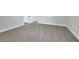 Bedroom with neutral walls, carpet and white baseboards at 500 W Hazel St, Orlando, FL 32804