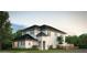 Two-story home with a white exterior, dark roof, and landscaping at 500 W Hazel St, Orlando, FL 32804