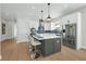 Contemporary kitchen island with seating, stainless steel appliances, and plenty of storage at 500 W Hazel St, Orlando, FL 32804