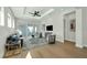 Bright living room with hardwood floors, modern decor, and sliding doors to the outdoor patio at 500 W Hazel St, Orlando, FL 32804