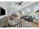 Bright, open-concept living space with hardwood floors and a view of the dining area at 500 W Hazel St, Orlando, FL 32804