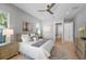 Bright main bedroom with wood floors, ceiling fan, and stylish decor at 500 W Hazel St, Orlando, FL 32804