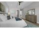 Bedroom featuring wood floors, ceiling fan, and stylish decor at 500 W Hazel St, Orlando, FL 32804