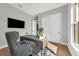 Home office with a gray chair, desk, and large window at 500 W Hazel St, Orlando, FL 32804
