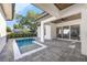 Modern backyard with a pool, pavers, and view of the exterior elevation at 500 W Hazel St, Orlando, FL 32804