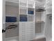 Walk-in closet with built-in shelving and drawers for organized storage at 500 W Hazel St, Orlando, FL 32804
