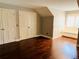 Large bedroom with hardwood floors, double closets, and window seat at 5001 Latrobe Dr, Windermere, FL 34786