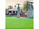 Landscaped area with sculptures near clubhouse at 5001 Latrobe Dr, Windermere, FL 34786