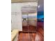 Stainless steel refrigerator with water dispenser in kitchen at 5001 Latrobe Dr, Windermere, FL 34786
