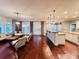 Open concept kitchen with granite counters and island at 5001 Latrobe Dr, Windermere, FL 34786