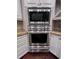 Built-in wall oven and microwave combination in the kitchen at 5001 Latrobe Dr, Windermere, FL 34786