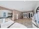 Outdoor kitchen with brick facade and stainless steel appliances at 5001 Latrobe Dr, Windermere, FL 34786
