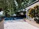 Enjoy this refreshing pool with brick patio and lush landscaping at 5001 Latrobe Dr, Windermere, FL 34786