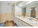 Updated bathroom with double vanity and a separate shower at 5032 River Lake Rd, Winter Haven, FL 33884