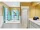 Bathroom with soaking tub and separate shower at 5032 River Lake Rd, Winter Haven, FL 33884