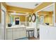 Clean bathroom with double vanity and large mirrors at 5032 River Lake Rd, Winter Haven, FL 33884