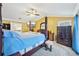 Spacious main bedroom with a post bed and dresser at 5032 River Lake Rd, Winter Haven, FL 33884