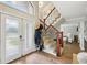 Bright entry with hardwood floors and staircase at 5032 River Lake Rd, Winter Haven, FL 33884