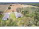 Aerial view of house and surrounding landscape at 606 Urick St, Fruitland Park, FL 34731