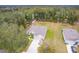Single story home with driveway and large backyard at 606 Urick St, Fruitland Park, FL 34731