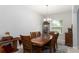 Formal dining room with wooden table and chairs at 606 Urick St, Fruitland Park, FL 34731