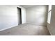 Simple bedroom with closet and carpet flooring at 6554 Rover Way, St Cloud, FL 34771