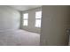Empty bedroom with neutral walls and carpet at 6554 Rover Way, St Cloud, FL 34771