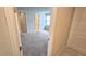Spacious bedroom with carpet flooring and access to bathroom and closet at 6554 Rover Way, St Cloud, FL 34771