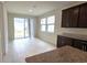 Bright dining area with sliding glass doors leading to the backyard at 6554 Rover Way, St Cloud, FL 34771