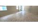 Spacious dining room with tile floors and access to the kitchen at 6554 Rover Way, St Cloud, FL 34771