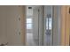 Hallway view of two bedrooms at 6554 Rover Way, St Cloud, FL 34771