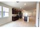 Modern kitchen with stainless steel appliances and granite countertops at 6554 Rover Way, St Cloud, FL 34771