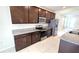 Modern kitchen with stainless steel appliances and granite countertops at 6554 Rover Way, St Cloud, FL 34771
