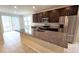 Modern kitchen with stainless steel appliances and granite countertops at 6554 Rover Way, St Cloud, FL 34771