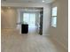 Open kitchen with island and stainless steel appliances at 6554 Rover Way, St Cloud, FL 34771