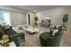 Elegant living room with a modern entertainment center and comfortable seating at 6554 Rover Way, St Cloud, FL 34771