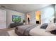Main bedroom with king-size bed and ensuite bathroom access at 6554 Rover Way, St Cloud, FL 34771