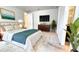 Main bedroom with a queen bed and ensuite bathroom at 6554 Rover Way, St Cloud, FL 34771