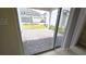 View of backyard patio from sliding glass door at 6554 Rover Way, St Cloud, FL 34771