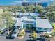 Aerial view of a community of light blue condo buildings at 67 Sabal Cay Court, New Smyrna Beach, FL 32169
