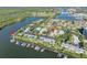Aerial view of community and waterfront access at 67 Sabal Cay Court, New Smyrna Beach, FL 32169