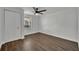 Simple bedroom with tile floors and double door closet at 67 Sabal Cay Court, New Smyrna Beach, FL 32169
