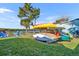 Kayaks and paddleboards available for recreation at 67 Sabal Cay Court, New Smyrna Beach, FL 32169