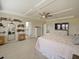 Main bedroom with en-suite bathroom access and ample closet space at 7043 Oxbow Rd, Minneola, FL 34715