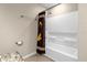 Clean bathroom with a shower/tub combo and a shower curtain at 8060 Bowery Dr, Winter Garden, FL 34787