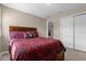 Bedroom with double bed and access to hallway at 8060 Bowery Dr, Winter Garden, FL 34787