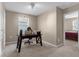 Home office with desk and view into bedroom at 8060 Bowery Dr, Winter Garden, FL 34787