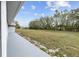 Large backyard with grassy area and concrete patio at 851 Marllo Rd, Kissimmee, FL 34744