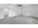 Large bedroom with neutral carpeting and multiple entrances at 851 Marllo Rd, Kissimmee, FL 34744